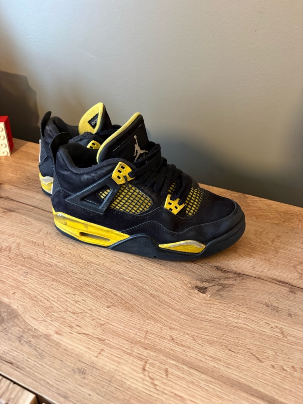 Jordan Kids Black and Yellow Retro 4 Sneakers